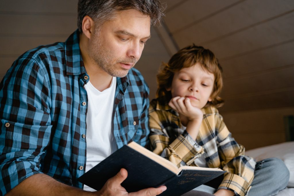 Dad and son reading